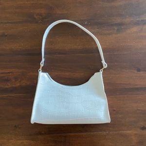 White faux croc purse